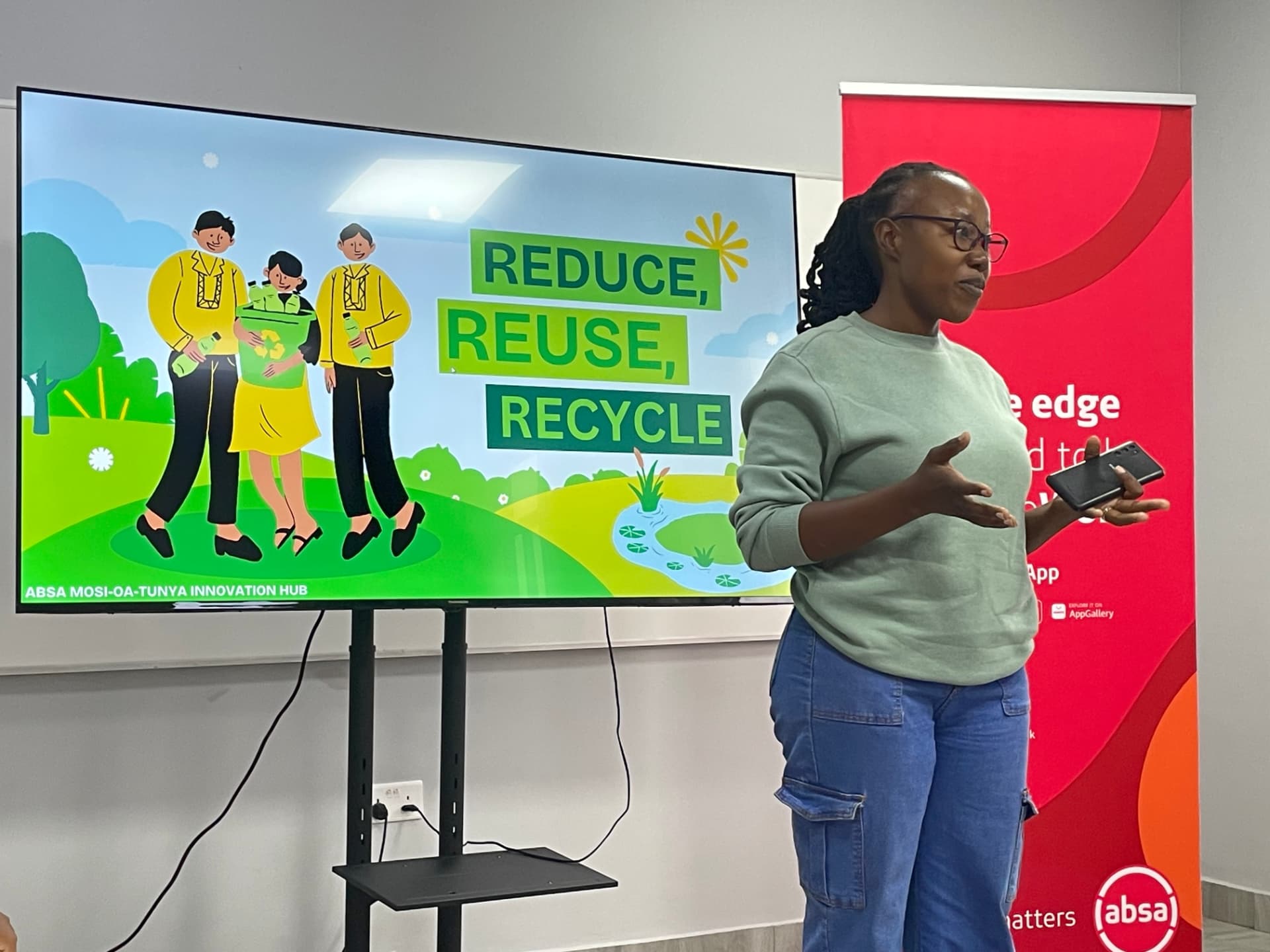 Facilitator presenting a Reduce, Reuse, Recycle session