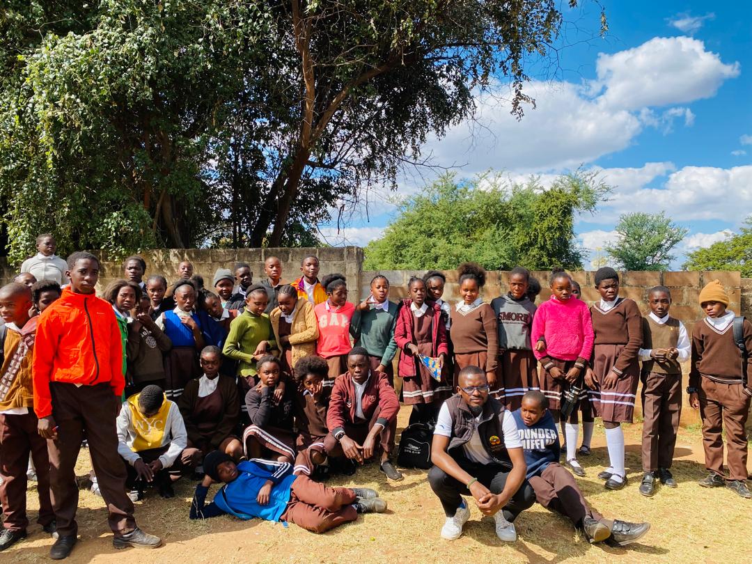 Pupils gathered outdoors after a climate education session